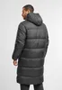 A man wearing a black puffer jacket, shown from the back. Voir les images du produit