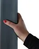 A hand holding a gray cylindrical object. Náhľad obrázku produktu