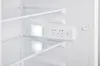 Interior view of a refrigerator with shelves and a control panel. Produktbild-Vorschau