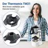 A woman is smiling in the background, while the foreground shows a kitchen appliance with its parts and accessories. Produktbild-Vorschau