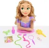 A styling head doll with accessories laid out in front of it. Náhľad obrázku produktu