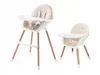 Two baby high chairs are shown against a white background. One is a full-sized high chair, and the other is a smaller, lower version. Produktbild-Vorschau