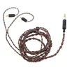 A close-up studio shot of a brown braided headphone cable with gold and black connectors against a white background. Produktbild-Vorschau