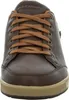 A close-up front view of a brown Skechers sneaker. Voir les images du produit