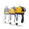 Three baby sippy cups with straws are arranged diagonally on a white background. Anteprima dell’immagine prodotto