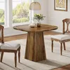 A dining table and chairs set in a well-lit room with large windows. Náhľad obrázku produktu