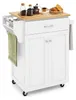 A white kitchen cart with a wooden top, a drawer, and two cabinet doors, shown on a white background. Podgląd zdjęcia produktu