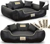 Two views of a black dog bed with beige trim and pillows, along with personalized name tags. Anteprima dell’immagine prodotto