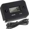 A black digital hour meter with a black wire attached, shown on a white background. Anteprima dell’immagine prodotto