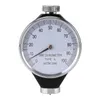 A close-up studio shot of a tire durometer on a white background. Voir les images du produit