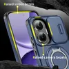 Close-up of a blue phone case with raised bezels and a camera cover. Produktbild-Vorschau