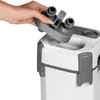 A hand is holding a part of an aquarium filter, showing how it connects to the main unit. Podgląd zdjęcia produktu