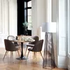 A dining set with chairs and a table in a well-lit room with wooden floors and white walls. Podgląd zdjęcia produktu