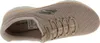 A close-up view of a beige Skechers sneaker. Anteprima dell’immagine prodotto