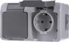 A close-up, studio shot of a light gray electrical outlet with a protective cover. Náhled obrázku produktu