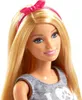Close-up of a Barbie doll's face and upper body. Podgląd zdjęcia produktu