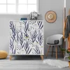 A hallway or entryway setting with a patterned cabinet, chair, and coat rack. Náhled obrázku produktu