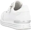 A white sneaker with a platform sole and silver accents. Voir les images du produit