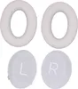 Two pairs of white ear pads and two smaller circular ear pads with L and R markings. Anteprima dell’immagine prodotto