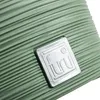 A close-up of a green textured surface with a silver logo. Produktbild-Vorschau