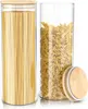 Two glass storage jars filled with pasta, one with spaghetti and the other with fusilli, are shown against a white background. A bamboo lid is placed next to one of the jars. Náhled obrázku produktu