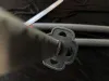 Close-up of a decorative katana and wakizashi set, focusing on the handle and guard. Voir les images du produit