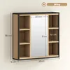 A wall-mounted cabinet with a mirror and shelves, with dimensions indicated. Produktbild-Vorschau