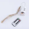 A set of LED firework lights with a remote control and battery pack, laid out on a white background. Produktbild-Vorschau