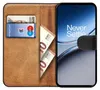 A wallet-style phone case with a phone inside, showing cards and money. Náhled obrázku produktu