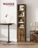 A tall, narrow bookshelf with a door and open shelves, placed next to a desk with a lamp and clock. Produktbild-Vorschau