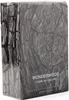 A close-up of a perfume box with a wood grain texture. Produktbild-Vorschau