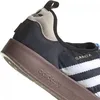 A close-up view of the heel and side of an Adidas Puffylette sneaker. Podgląd zdjęcia produktu