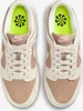 A top-down view of a pair of Nike Dunk Low Next Nature sneakers. Produktbild-Vorschau