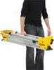 A person is holding a folded Dewalt DE7033 Universal Untergestell zusammenklappbar. Produktbild-Vorschau