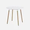 A white round table with three wooden legs against a plain white background. Anteprima dell’immagine prodotto
