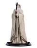 A statue of Saruman the White Wizard from The Lord of the Rings, standing on a black base. Produktbild-Vorschau
