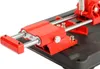 Close-up of a red metal cutting stand with silver metal rods. Anteprima dell’immagine prodotto