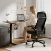A woman is working at a standing desk in a home office setting. Podgląd zdjęcia produktu