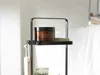 A close-up of a bathroom shelf with a jar of body scrub and a bar of soap. Podgląd zdjęcia produktu