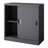 A dark gray metal filing cabinet with sliding doors and one shelf. Podgląd zdjęcia produktu