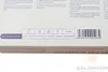 A close-up view of product information and a barcode on a box. Produktbild-Vorschau