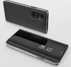 A black smartphone case with a clear view flip cover is shown from two angles against a light gray and white background. Produktbild-Vorschau