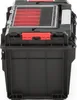 A black tool box with red accents and a clear lid. Náhled obrázku produktu