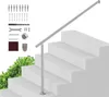 A silver handrail installed on outdoor concrete steps, with a set of installation accessories shown in the upper left corner. Podgląd zdjęcia produktu