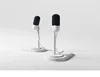 Two modern microphones on white stands against a white background. Náhled obrázku produktu