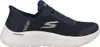 A side view of a navy blue Skechers Go Walk slip-on sneaker with a white sole. Produktbild-Vorschau