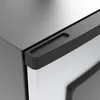 A close-up view of the handle and top corner of a metallic appliance, likely a smoker or refrigerator. Produktbild-Vorschau