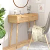 A console table with two drawers and a chair next to it, in a room setting. Anteprima dell’immagine prodotto