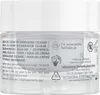 The image shows the side of a clear plastic jar with white text and symbols printed on it. Náhľad obrázku produktu