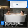 A couple relaxing in a modern bathroom in a bathtub. Produktbild-Vorschau